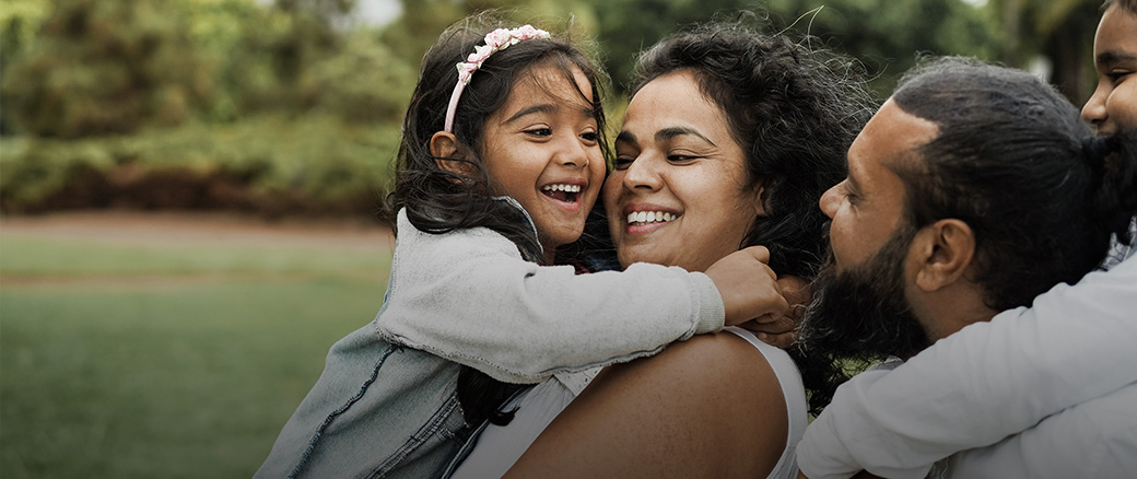 Happy family hugging